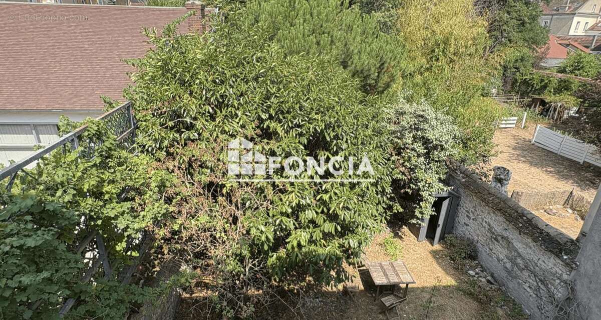 Duplex en centre-ville avec jardin privatif - photo 4