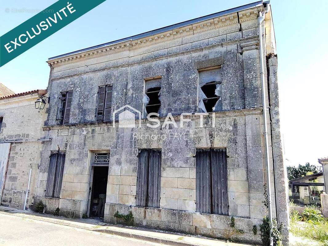 Photo 1 - Maison à CONSAC