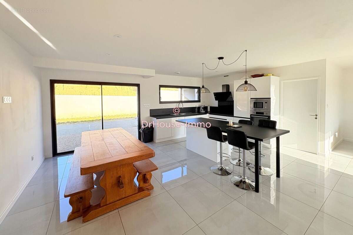 Maison à COUFFOULENS