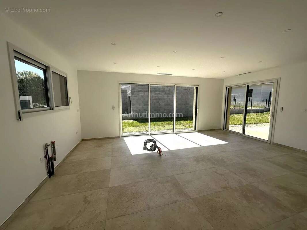 Maison à MAGNIEU