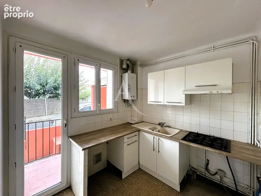 Appartement 3 pièces 51.57 m2 traversant parking et cave! - photo 4