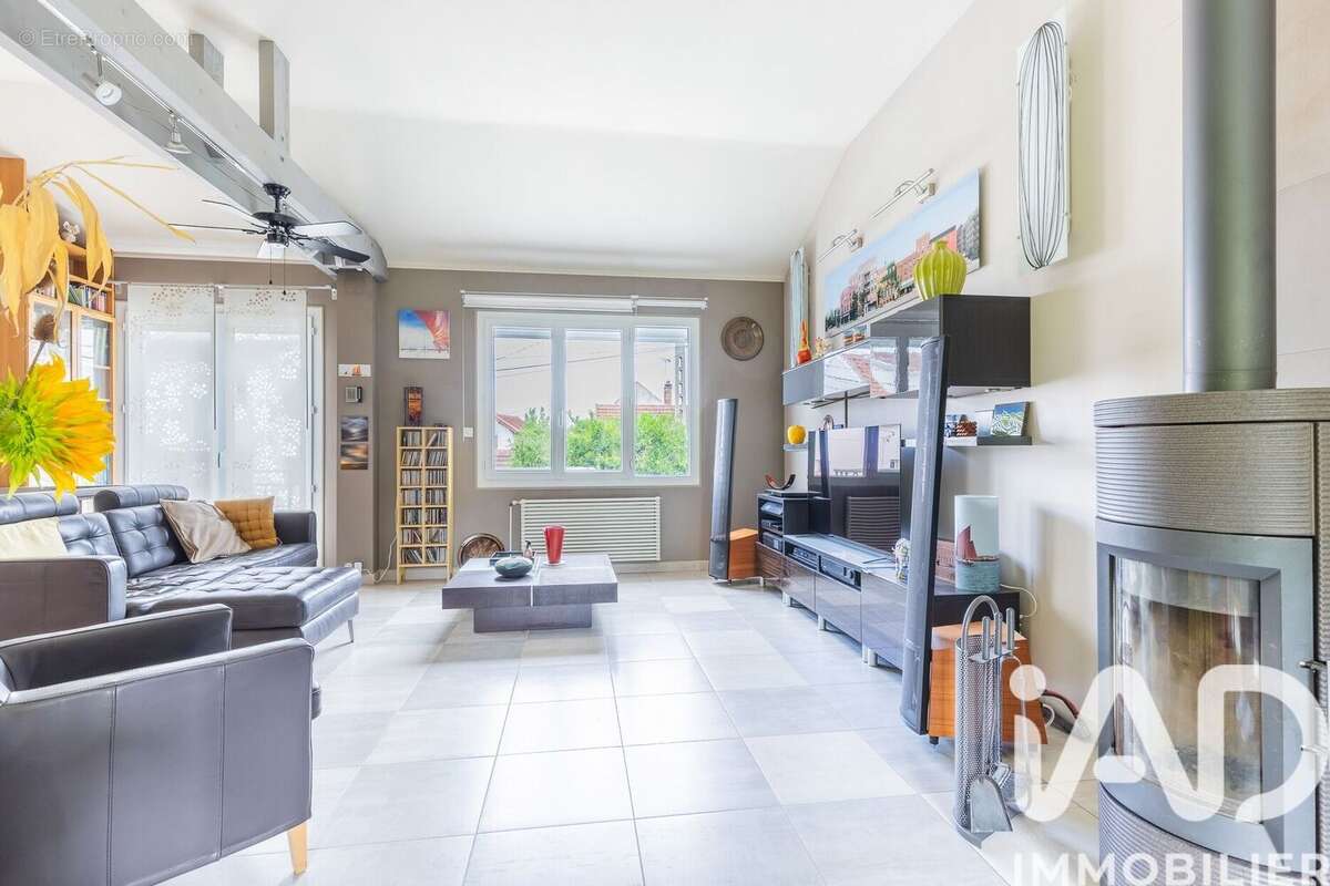 Maison 88 m² à Igny  - photo 3