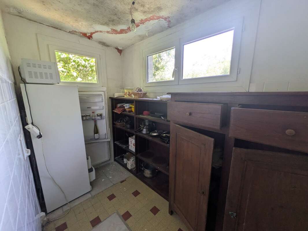 Guemene sur scorff maison bourgeoise  7 pièces 185 m² environ avec garage et dépendances,un puits une parcelle de 3706m² - photo 11