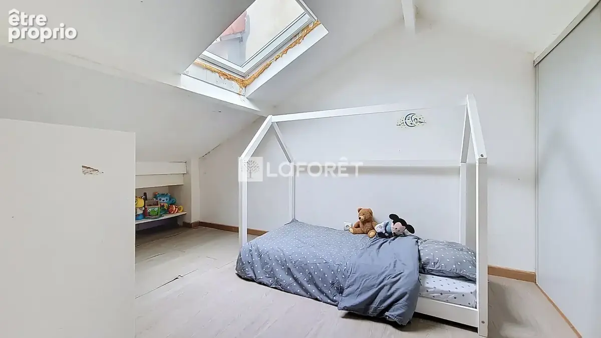 Un duplex aux volumes généreux sous les toits - photo 9
