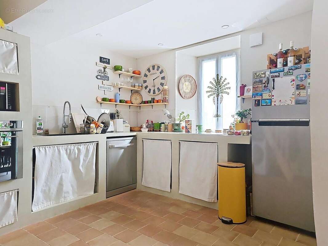 Maison 100 m² à Villeneuve-La-Comptal  - photo 4