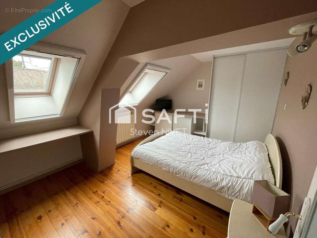 Photo 2 - Maison à SAINT-GENOU
