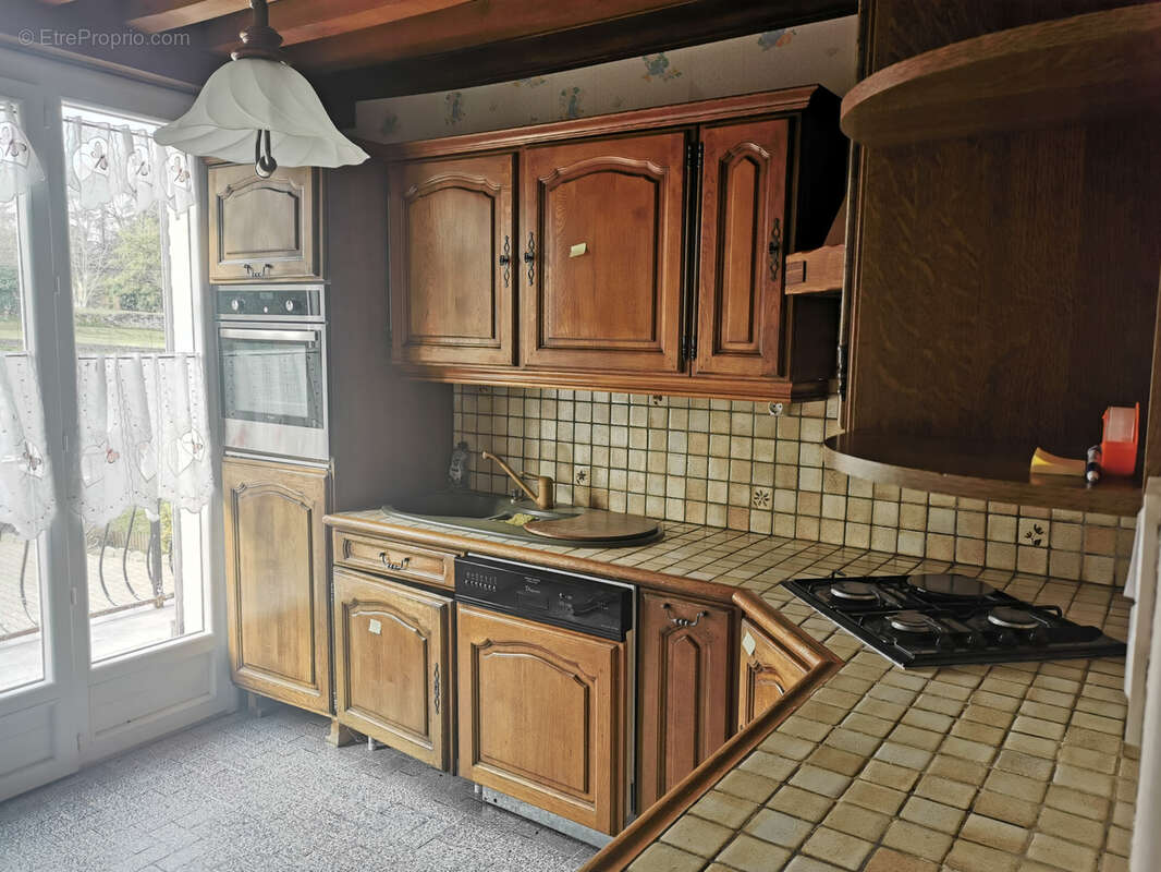 Maison à SAINT-BAUDILLE-DE-LA-TOUR