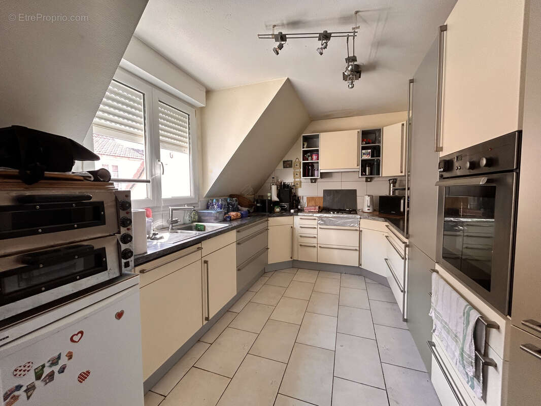 Appartement 3/4 pieces avec balcon et garage - centre ville - photo 3