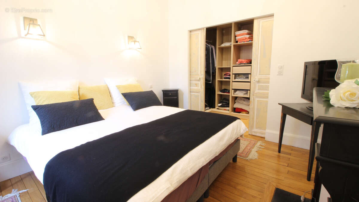 Bel appartement T2 avec ascenseur en centre-ville de Vichy avec cave et mansarde - photo 11