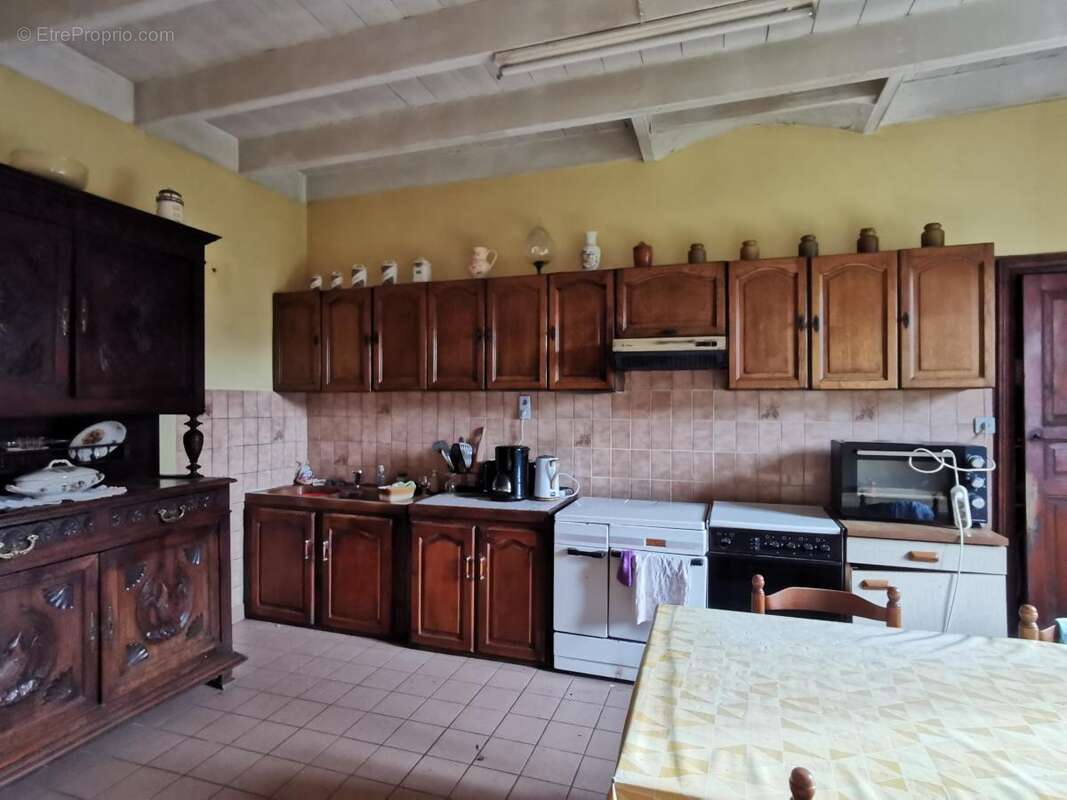 Maison à CAOUENNEC-LANVEZEAC