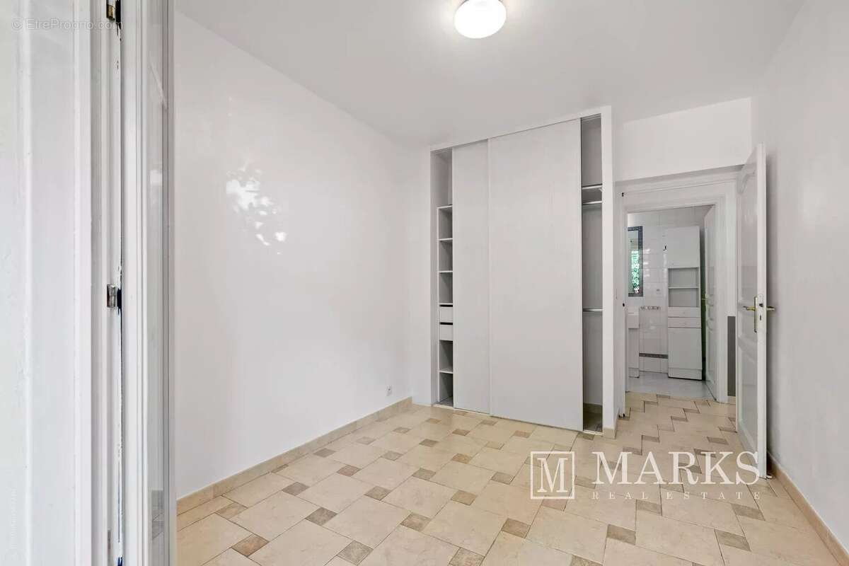 Appartement de 2 chambres avec terrasse, jardin et garage - photo 14