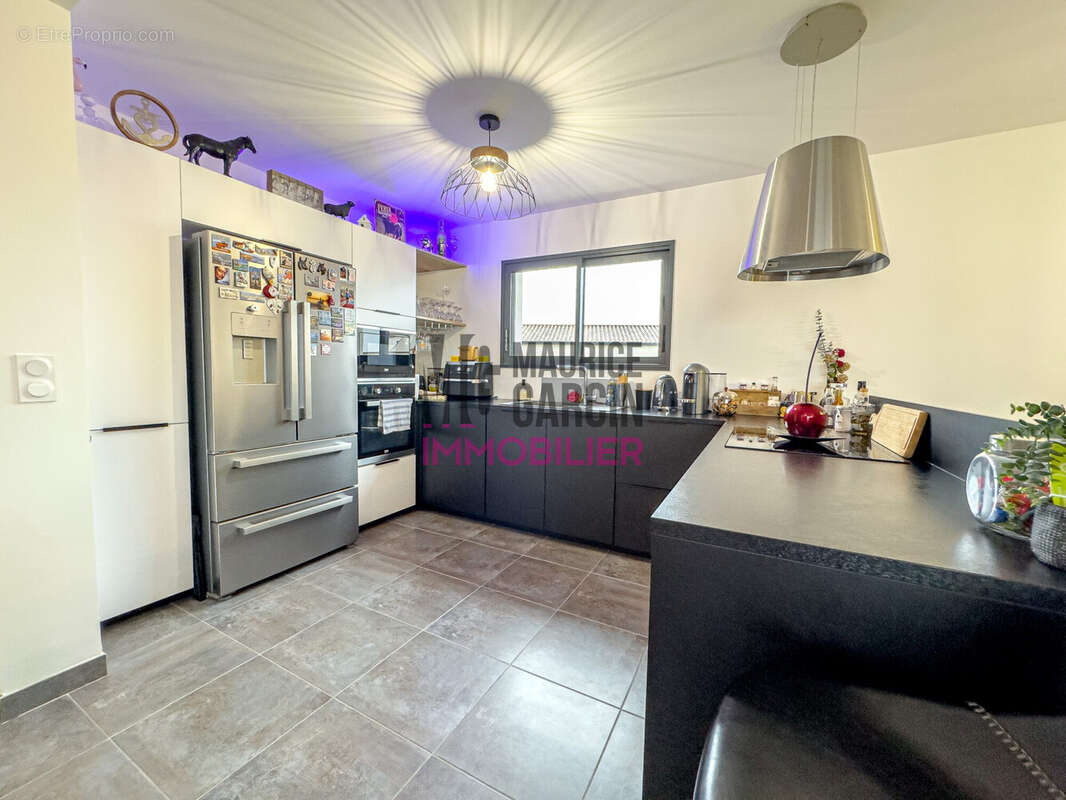 Maison à LAUDUN-L'ARDOISE