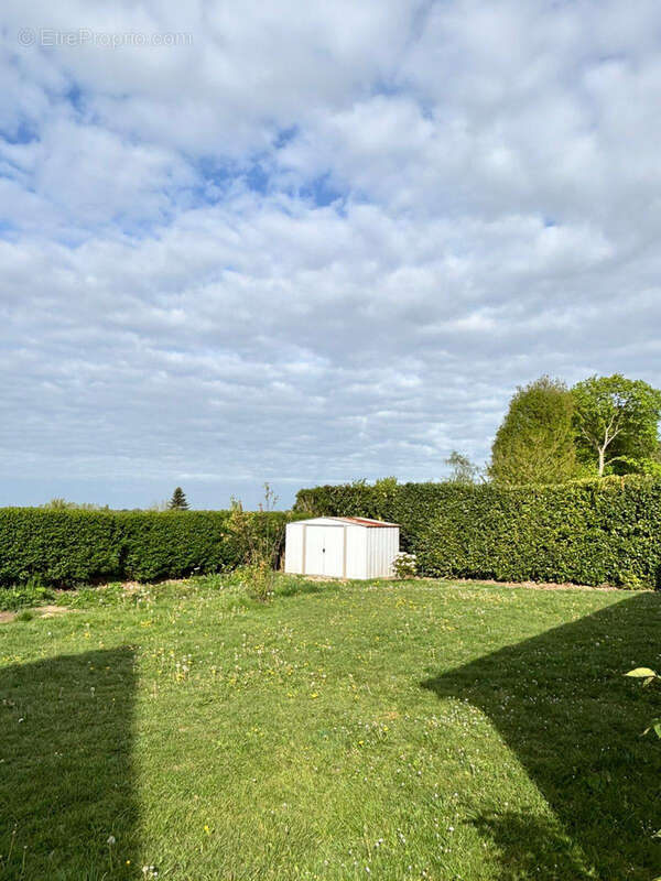 Maison traditionnelle de plain-pied, alliant confort et fonctionnalité - photo 6