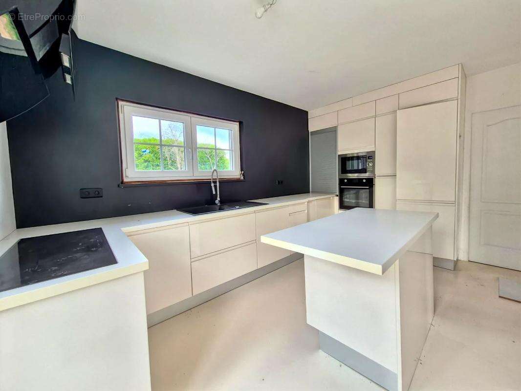 Maison à AUBERGENVILLE