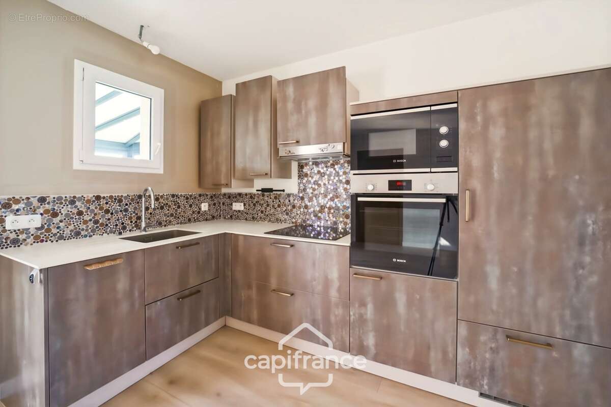 Maison de plain-pied, 3 chambres, véranda, piscine chauffée et jardin paysager – Courlaoux, à 10 min de Lons-le-Saunier (39000) - photo 4