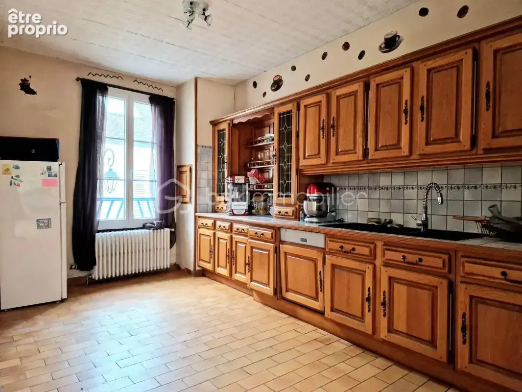 Maison ancienne avec jardin, terrasse et grand garage ! - photo 6