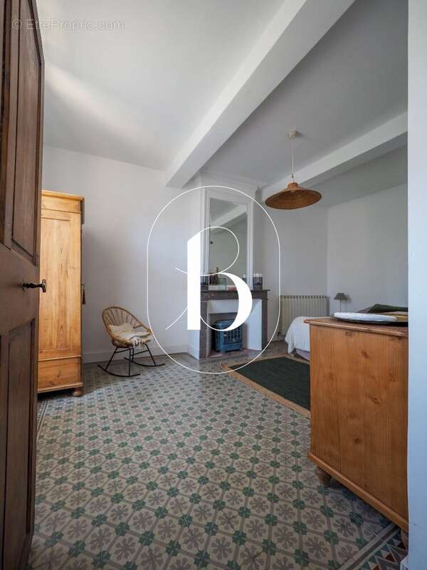 Maison à LAUDUN-L'ARDOISE