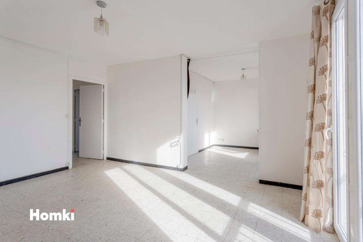 Appartement 3 pièces de 69m2 avec parking et vue à Nîmes Jean-Jaurès - photo 7