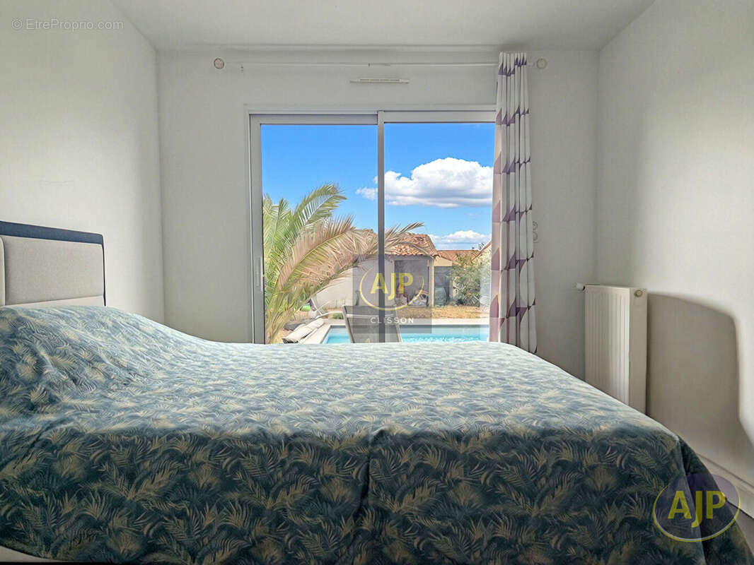 Maison 5 chambres piscine Gétigné centre - photo 9
