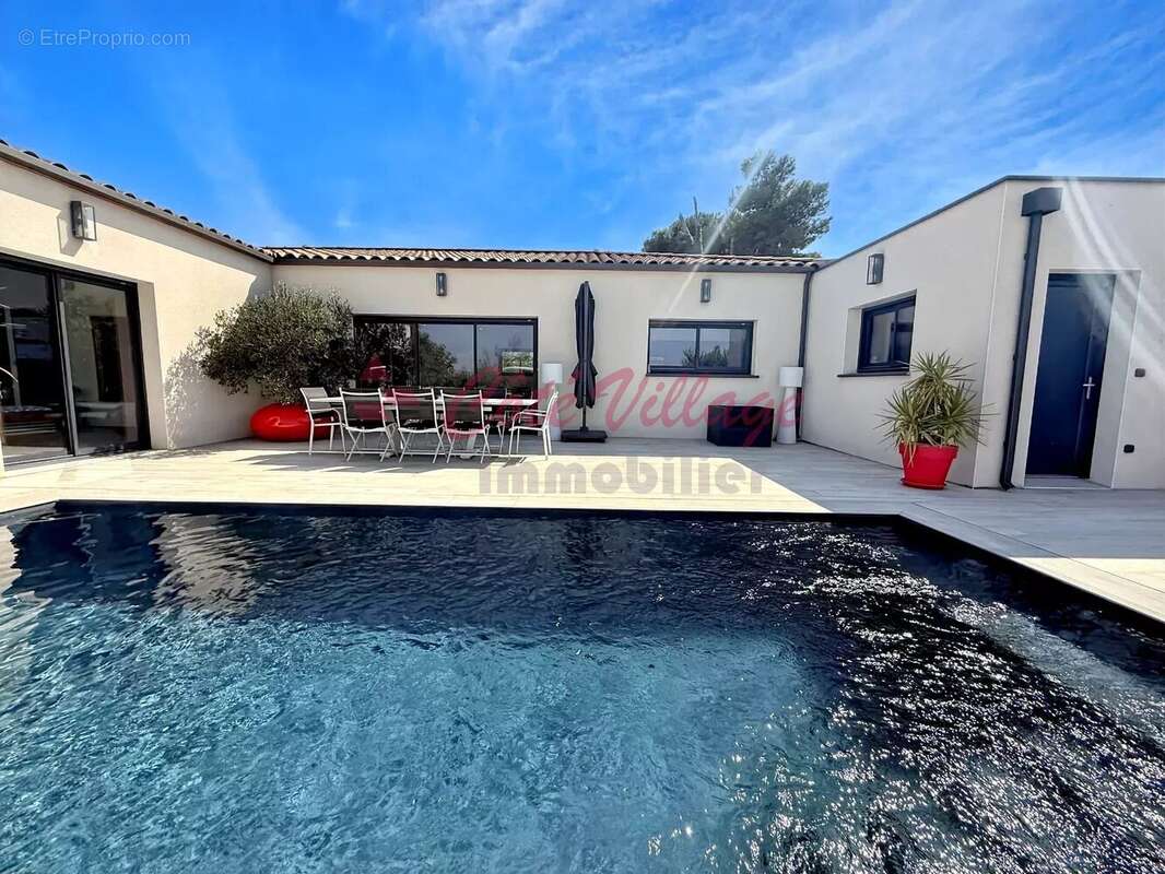 Superbe maison de plain-pied avec vue dégagée , piscine et garage - photo 2