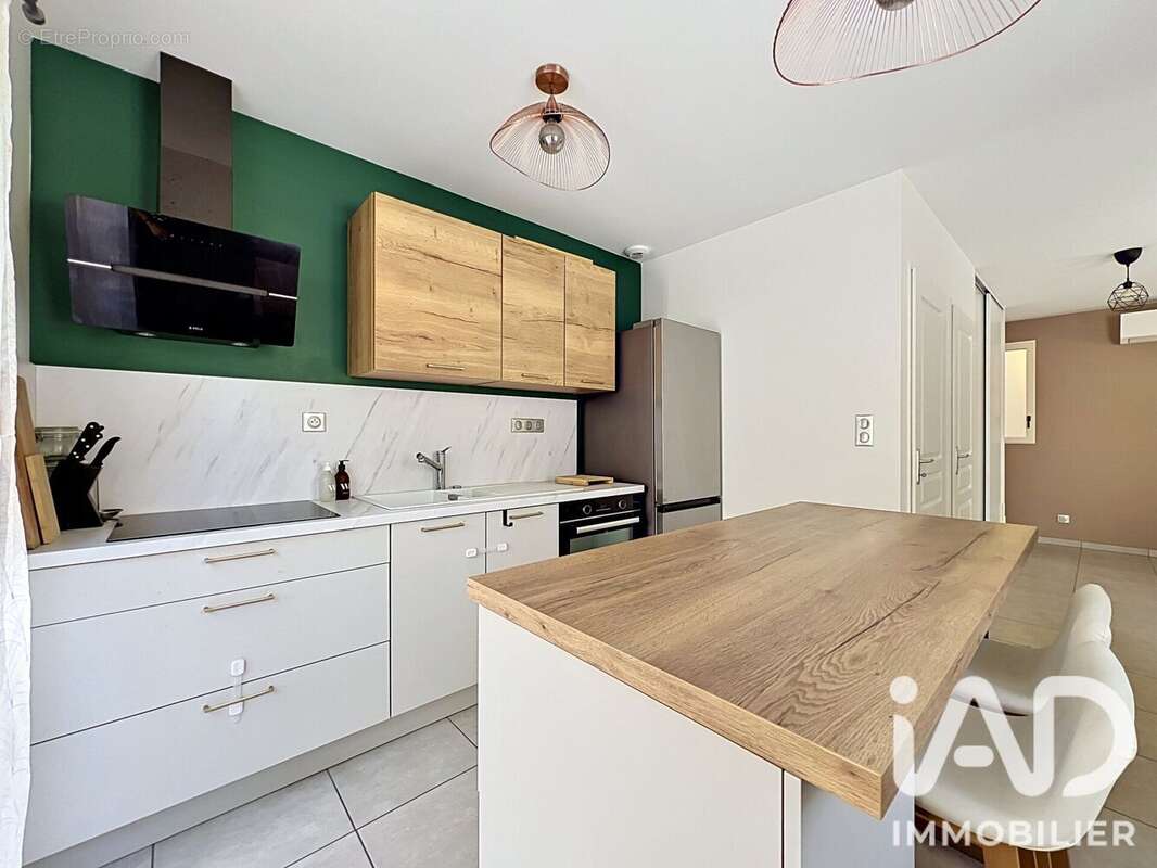 Maison 63 m² à Saint-Priest  - photo 4