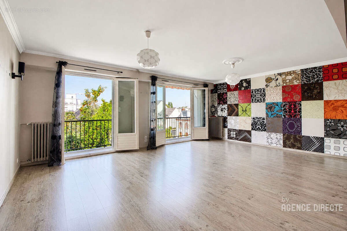 Appartement Rennes 4 pièce(s) 100.9 m2 avec cave et parking - photo 2