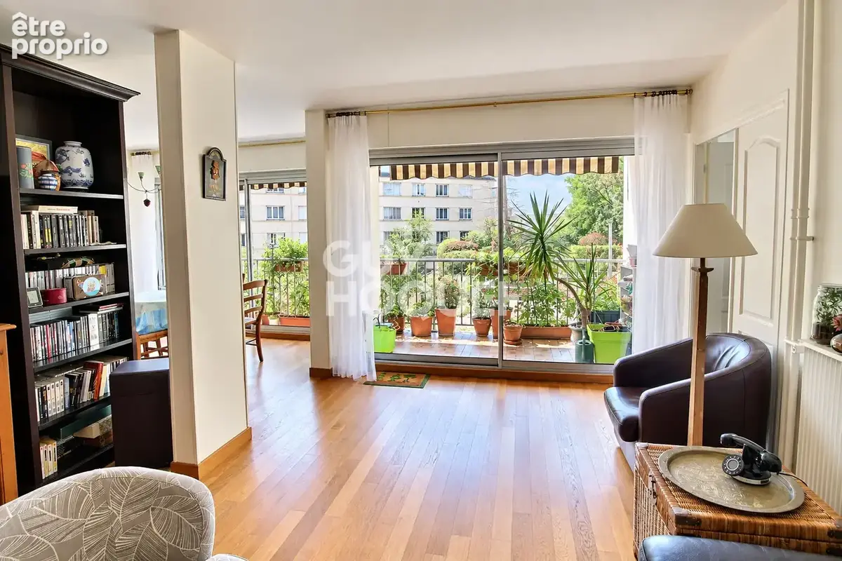 Appartement 4 pièces de 94 m² en rez-de-jardin - photo 2