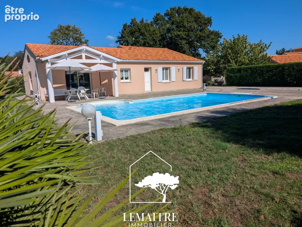 Maison de plain-pied avec piscine   4 chambres   grand terrain de 1 456 m2 - photo 11