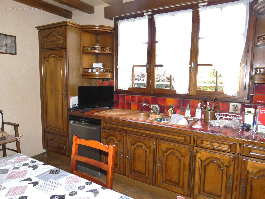 Maison à US