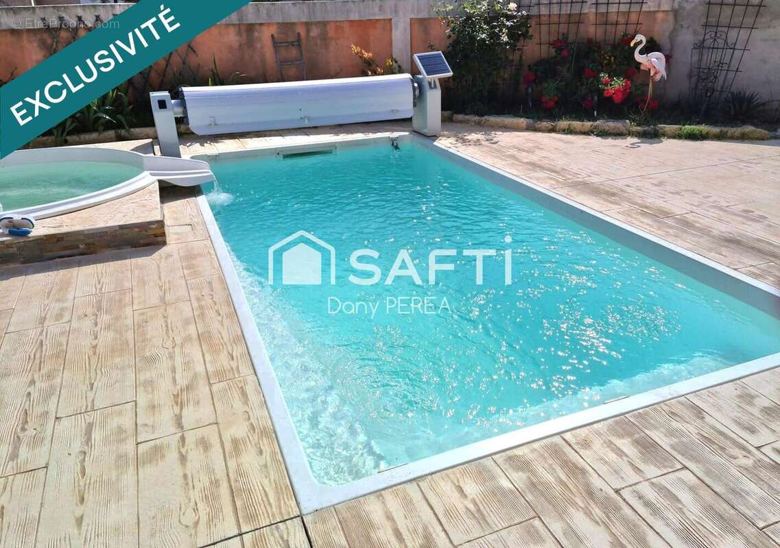 Photo 3 - Maison à SAINT-LAURENT-D'AIGOUZE