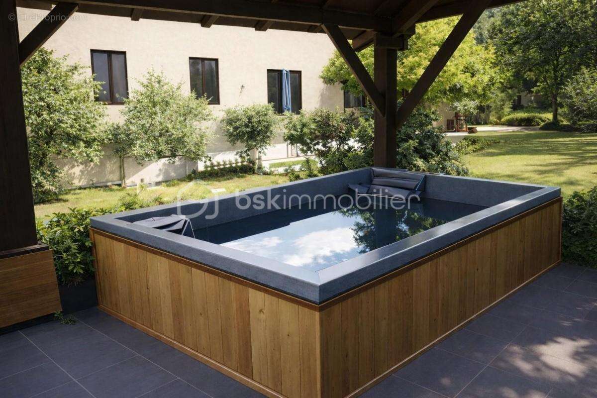Propriete + 2 studios loués 1 100€/mois – piscine – terrain clôturé arboré 2 200m² – - photo 4