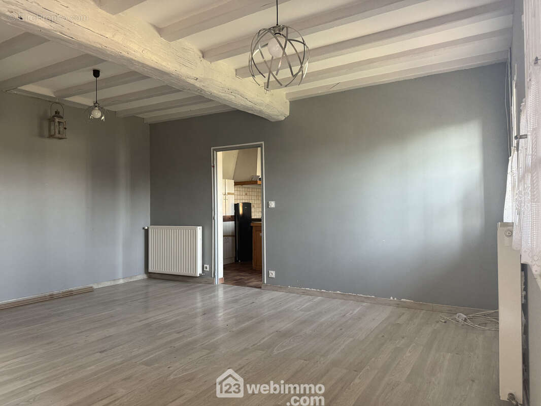 Au rez-de-chaussée, le salon de 26 m2. - Maison à SAINT-CLAIR