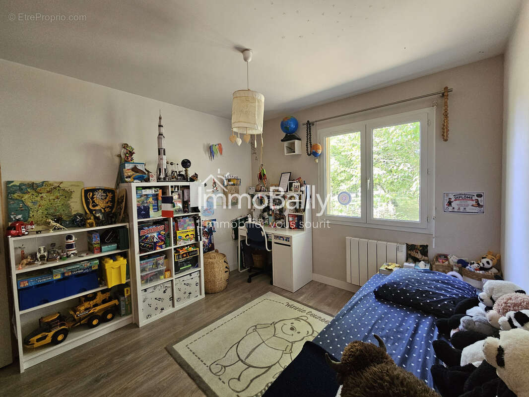 Maison familiale de plain-pied   5 chambres   Terrain de 1 672 m2  en lisière de forêt - photo 10
