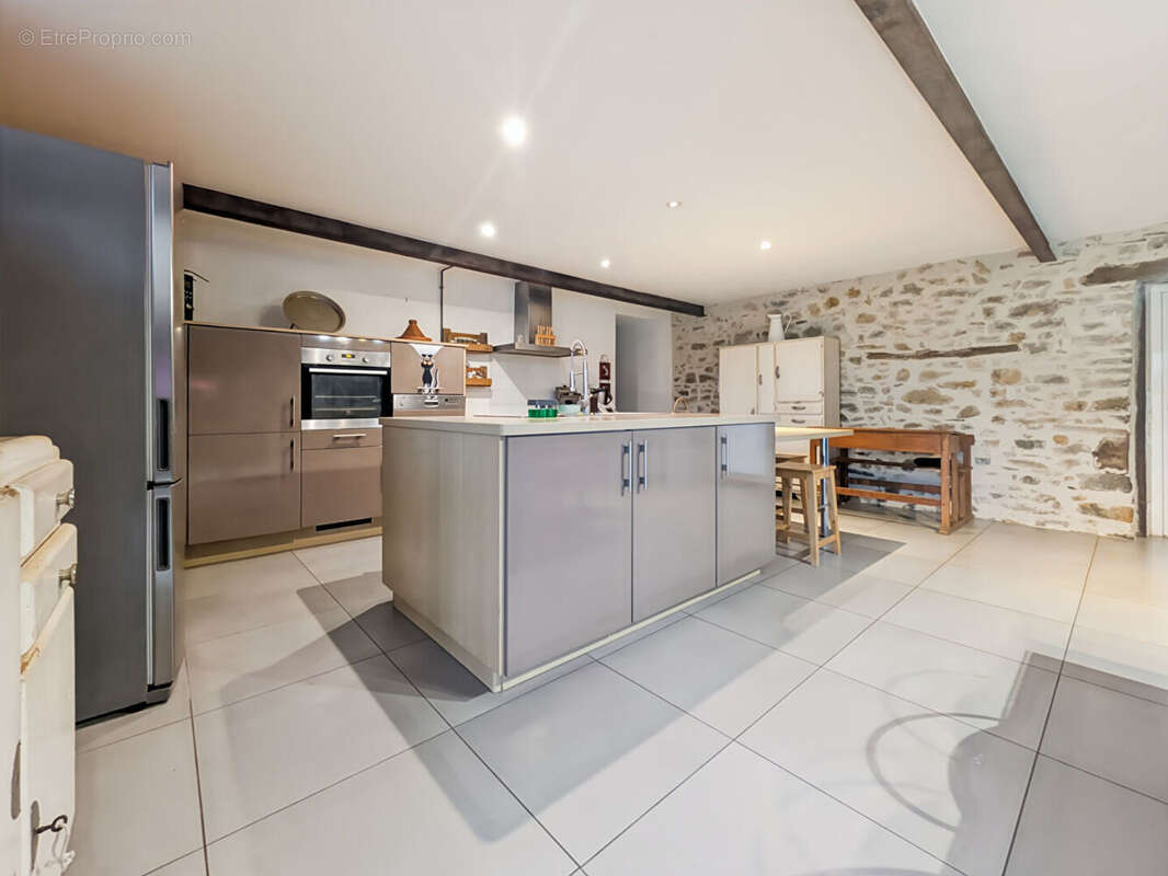 Maison à SAINT-AUBIN-D'AUBIGNE