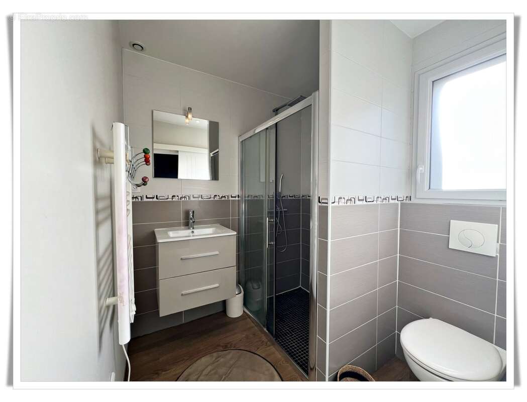 À vendre au Sourn, à proximité immédiate de Pontivy : découvrez cette spacieuse maison familiale de plus de 200 m² habitables - photo 17