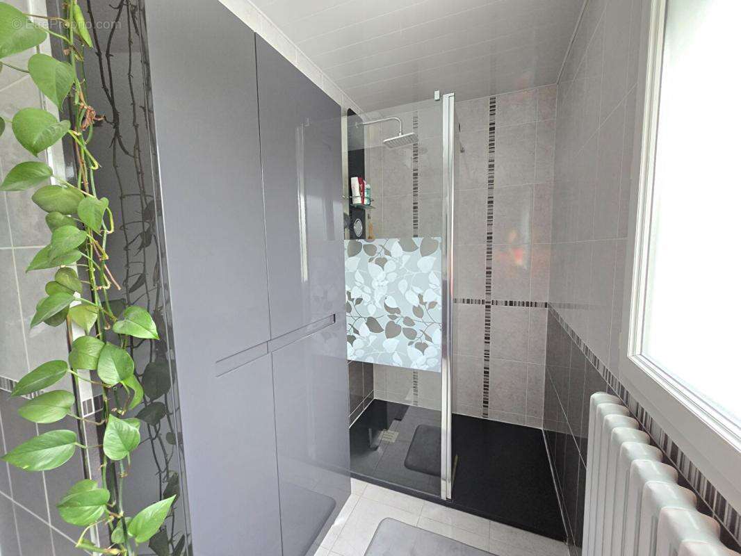 Maison individuelle avec 4 chambres, véranda et magnifique jardin - 175 M2 utiles - photo 7