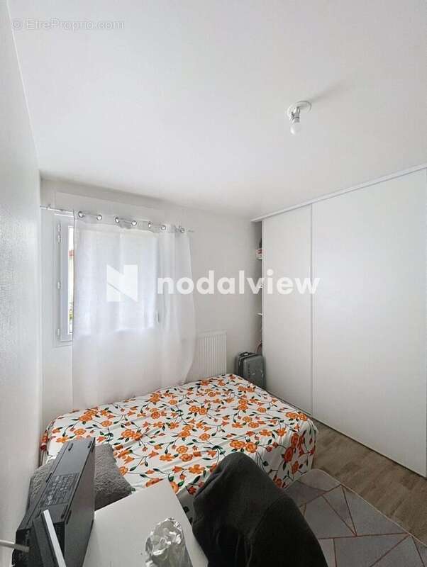 Photo 9 - Appartement à FLEURY-LES-AUBRAIS