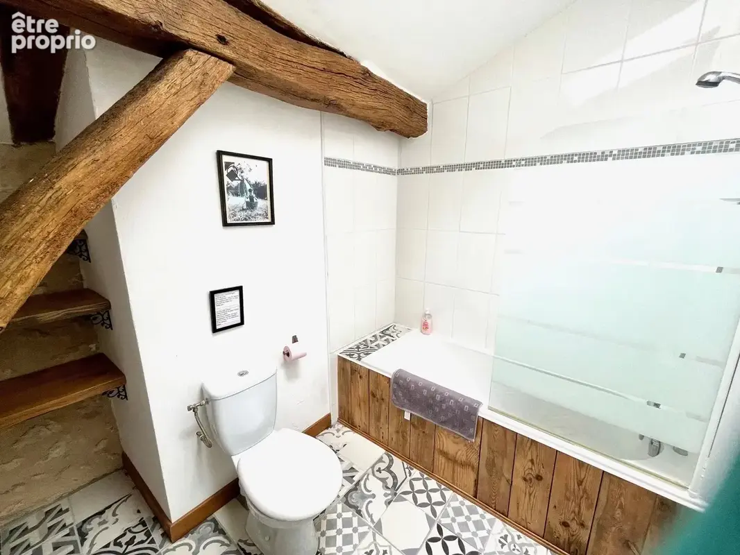 Superbe grange réaménagée avec 6 chambres et 4 salles de bains, offrant une vue imprenable - photo 14