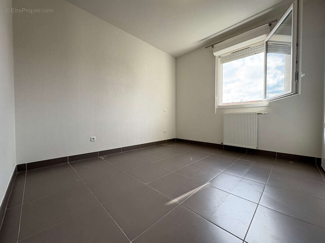 Appartement à FROUZINS
