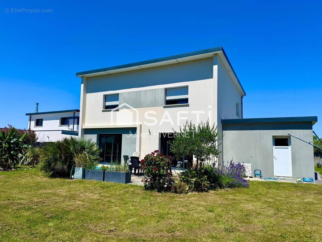 Photo 1 - Maison à LANDIVISIAU