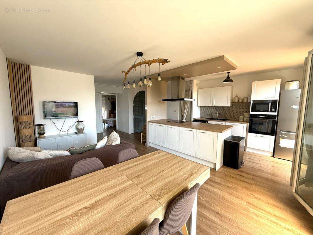 Appartement 65 m² 2 chambres terrasse garage et piscine - photo 3