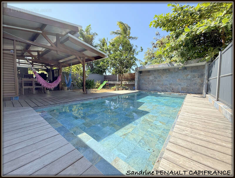 A vendre a kourou (97310) une magnifique villa t7 de 246 m² - avec 2 appartements t2 - terrain de 345 m² - au prix de 599 000 € - photo 3