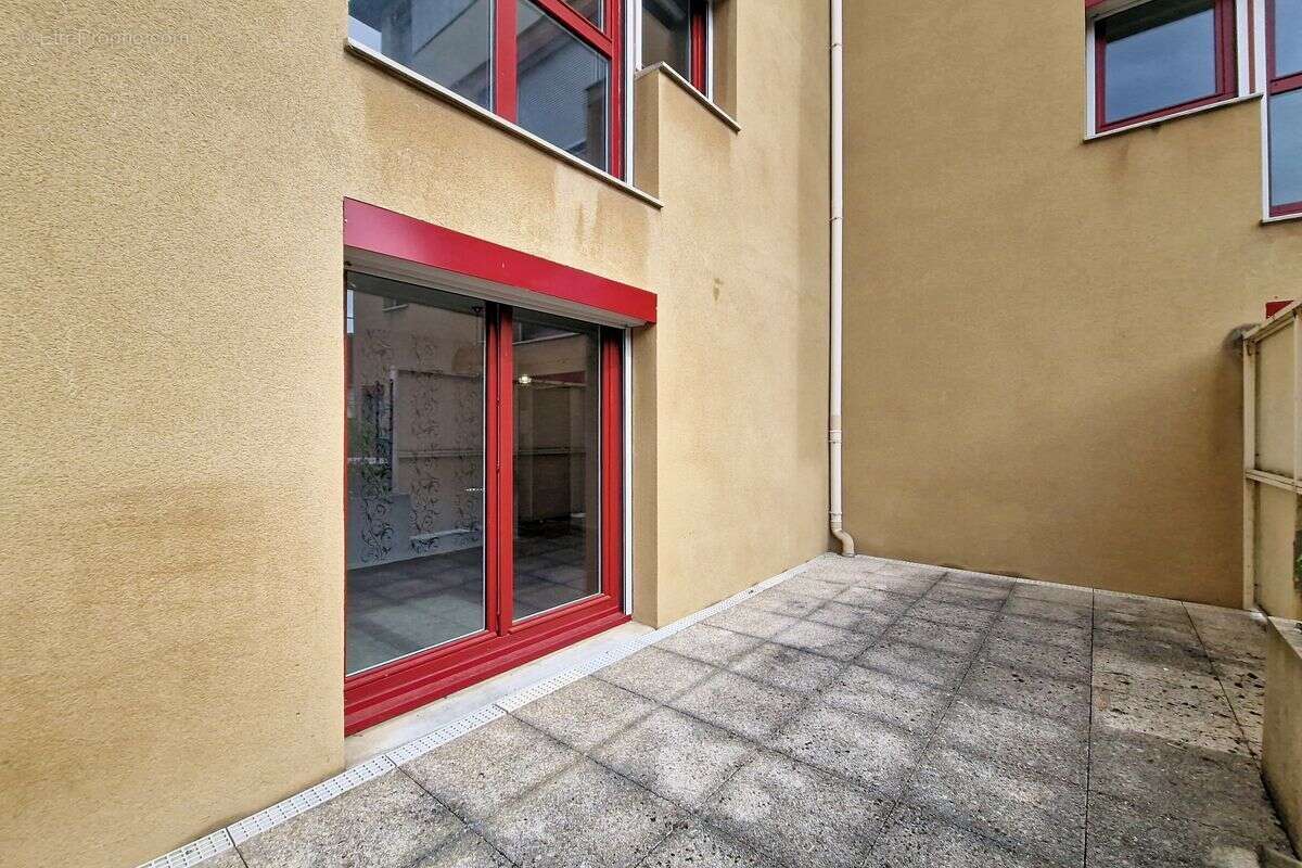 Appartement T2 en rez de jardin - photo 5