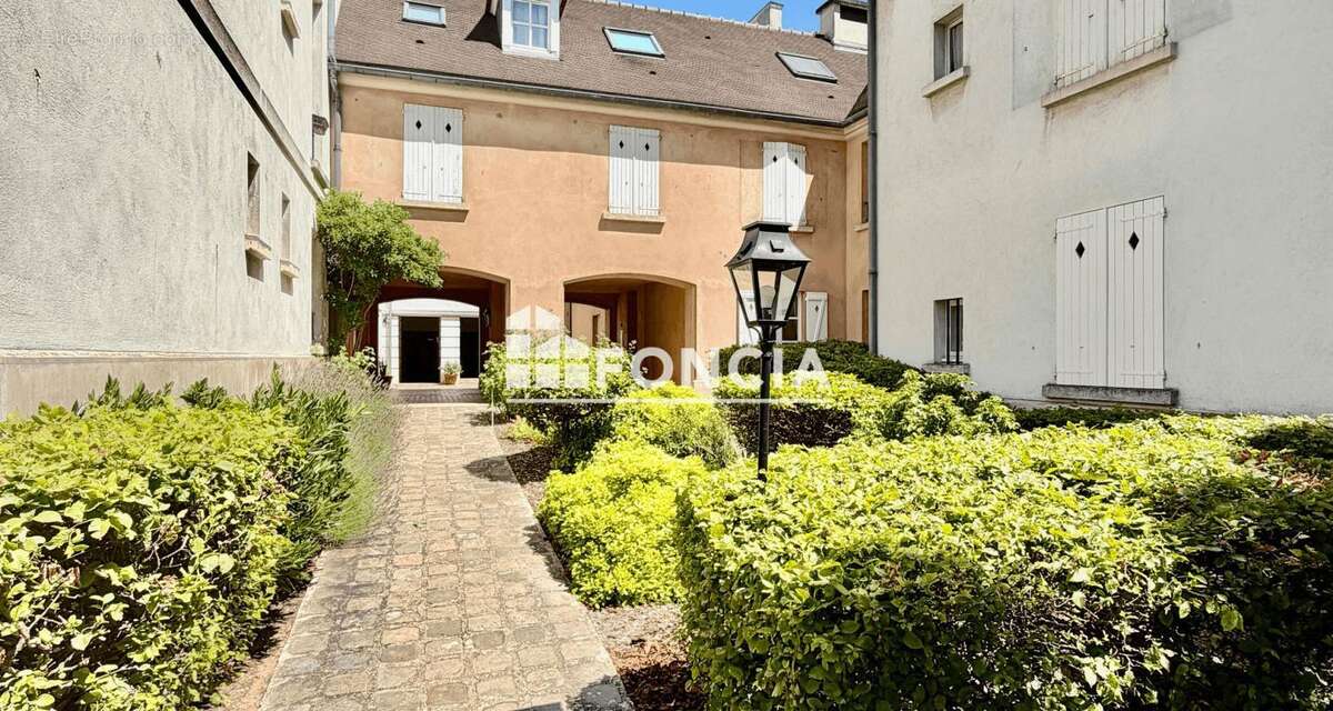 Vente en bloc de 9 parkings sous-sol dans le centre ville - photo 3
