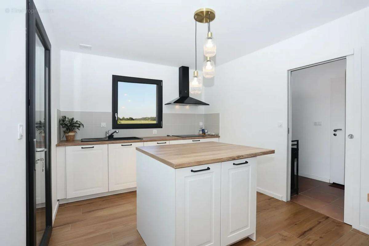 Maison de 5 pièces de 123 m² à La Bouëxière - photo 6