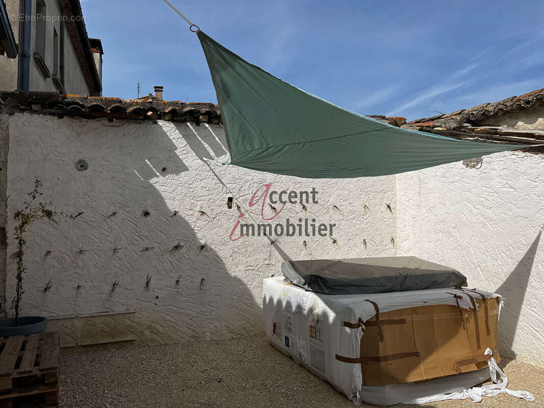 EXCLUSIVITE : Maison plain pied avec jardin T2 Bis (mezzanine) et places de parking - photo 8