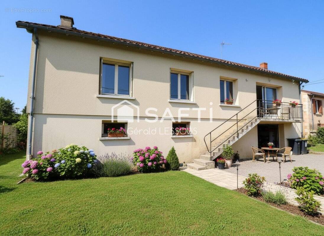 Photo 1 - Maison à SAINT-JULIEN-L&#039;ARS