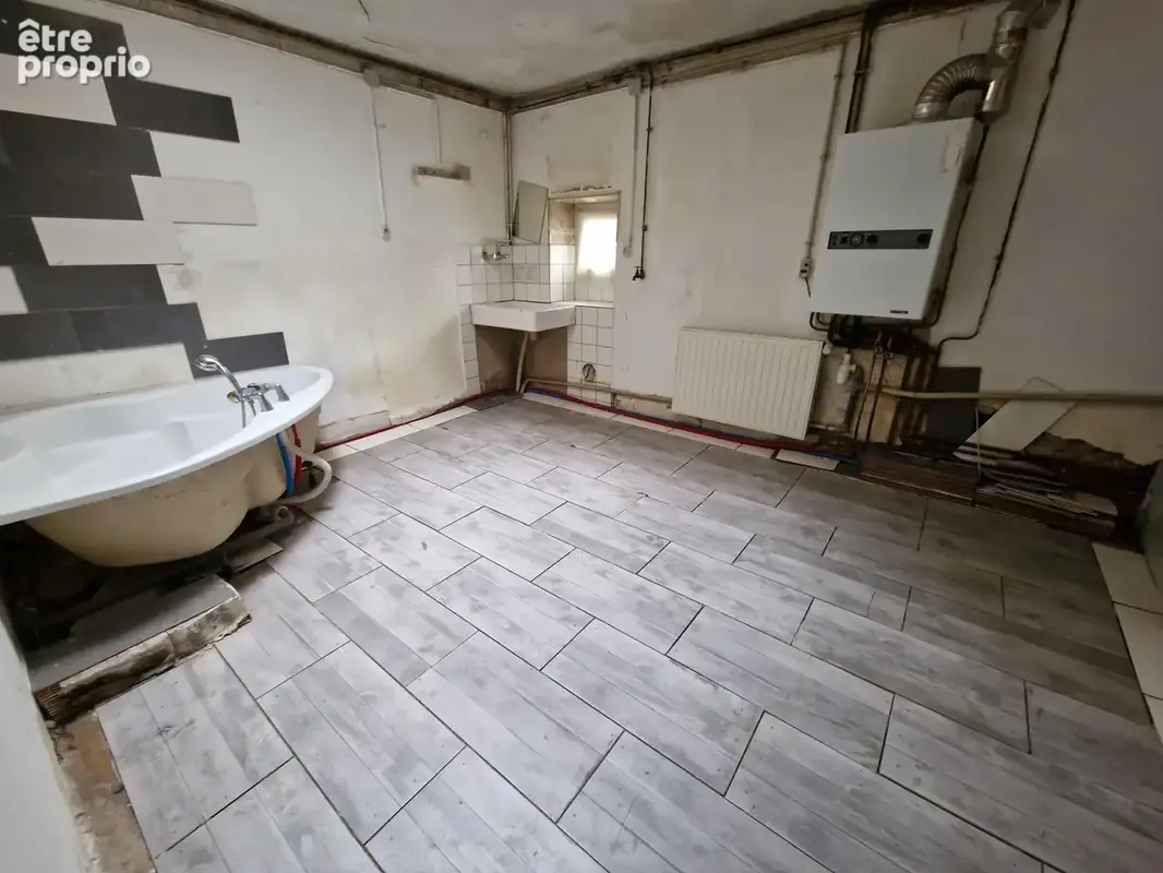 MAISON à vendre VITTEL (88) Possibilité création 2 appartements T2 et T3 sur TERRAIN de 400 m2 - photo 7