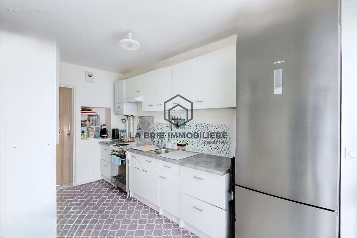 Maison 92 m² à Villecresnes  - photo 7