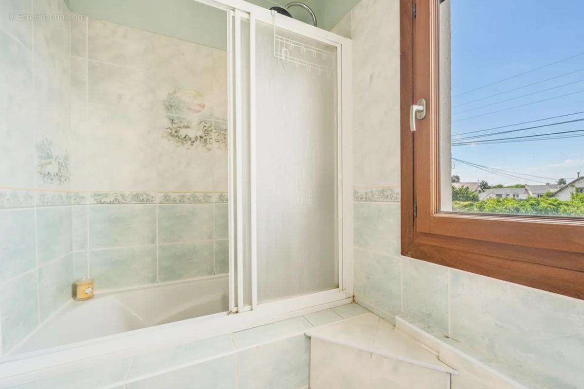 Maison de 5 pièces de 80 m² à Sainte-Geneviève-des-Bois - photo 11